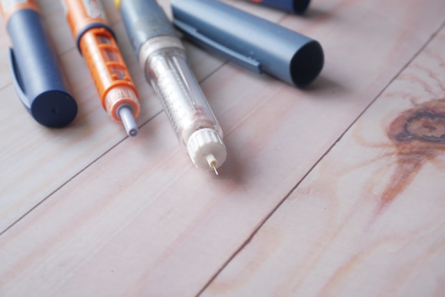 two insulins pens on a table