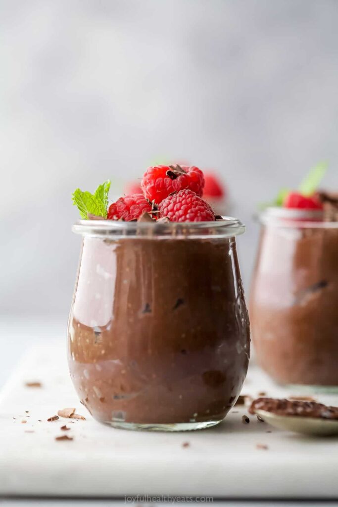 Chia chocolate pudding topped with raspberries