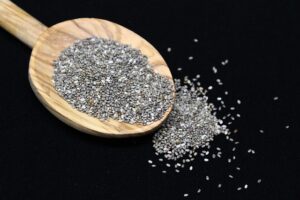 Chia seeds on a wooden spoon