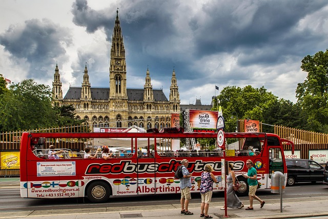 tour bus at bus stop opposite church